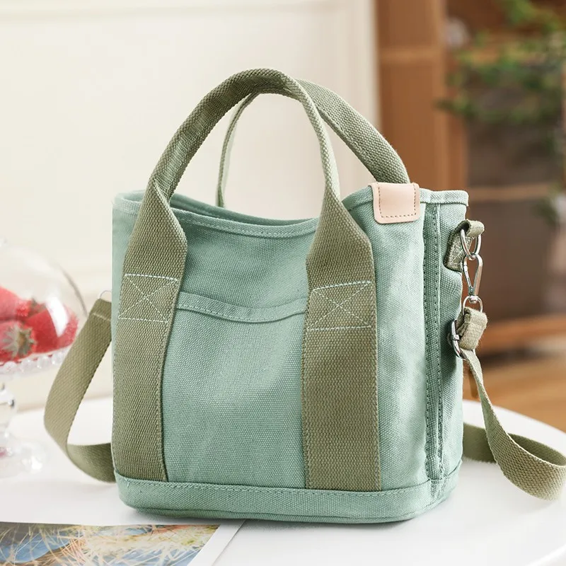 

Canvas handbag Large capacity multi-function high quality shoulder bag Shopping travel waterproof women's bag 2023 Latest