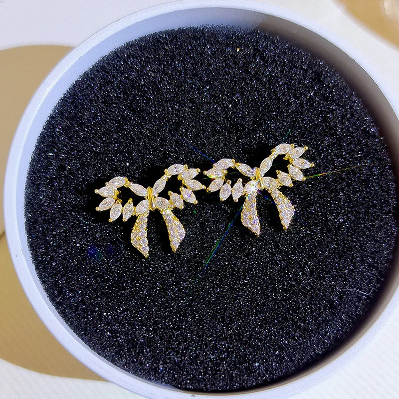 

Sweet bow temperament earrings female design imitation zircon wing earrings without ear holes female jewelry