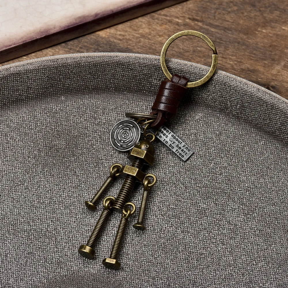 Accessories retro male and female lovers cowhide key chain with movable hands and feet creative robot Keychain