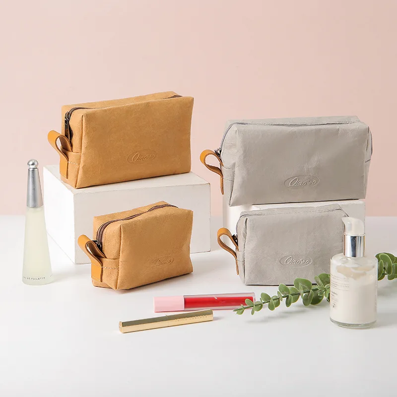 

2023 Hot Wholesale 2 Sizes 2 Color Large Capacity Washable Kraft Paper Bag Ladies Travel Cosmetic Storage Bag Can Be Customized