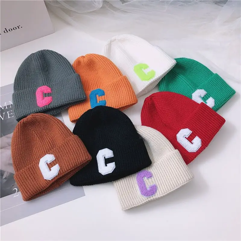 

Корейская версия Осень-зима карамельные цвета C буква ins Стильная Детская шерстяная шапка Мужской и Женский Детский Теплый джемпер вязаная ...