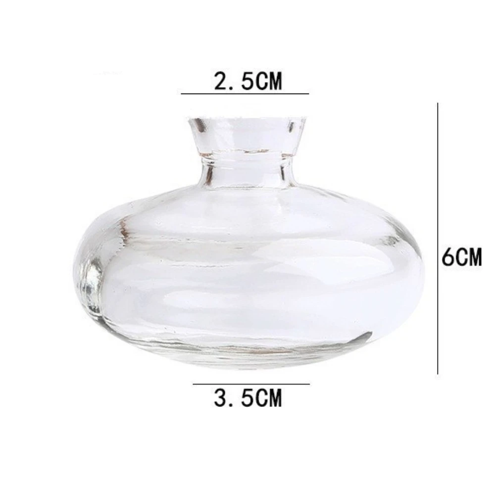 

Прозрачная стеклянная мини-ваза