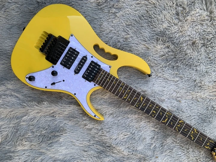 

In stock yellow Zombie Jay Yuenger ICJ100WZ Iceman Galactic yellow Electric Guitar Floyd Rose Tremolo Bridge, Abalone Binding