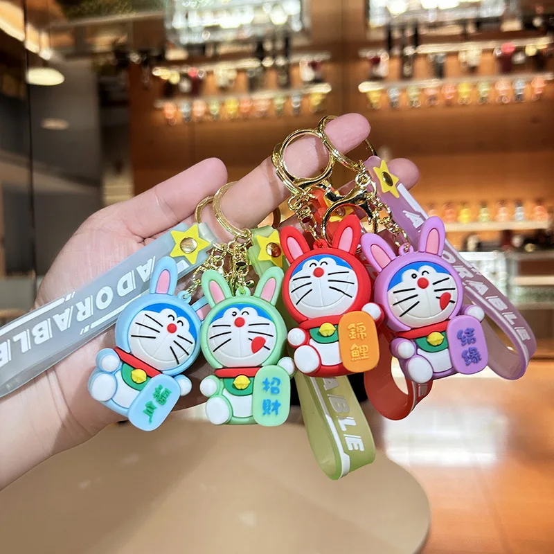 

Мультяшный милый новый поворотный брелок для ключей с роботом Doraemon, маленький подарок, рождественский подарок на день рождения