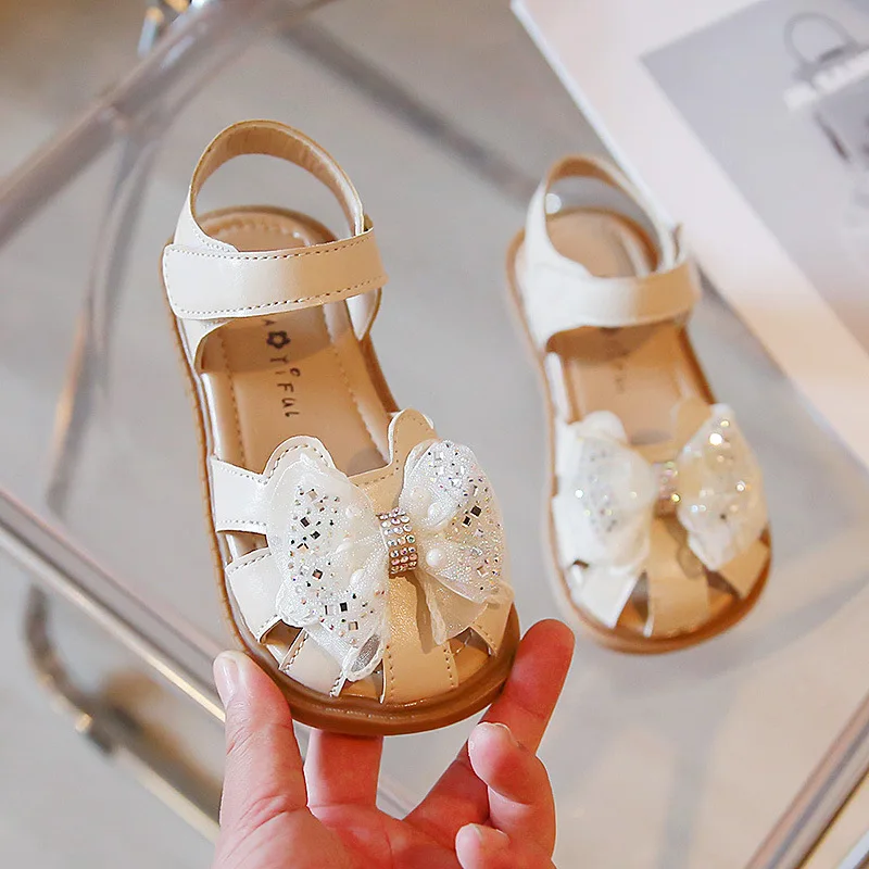 

Girls Sandals 2022 Summer New Bow Princess Children Sandals Fashion Wild Hollow Out Breathable Kids Shoes H158