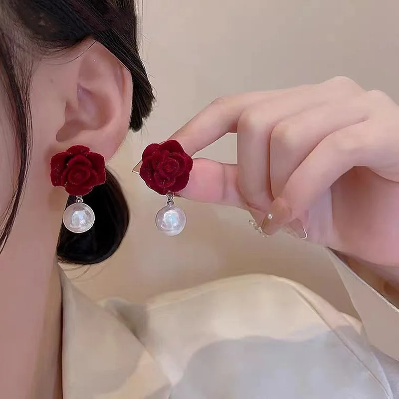 

Silver needle flocked flower pearl shell earrings high-grade sense stud earrings fashionable foreign earrings earings for women