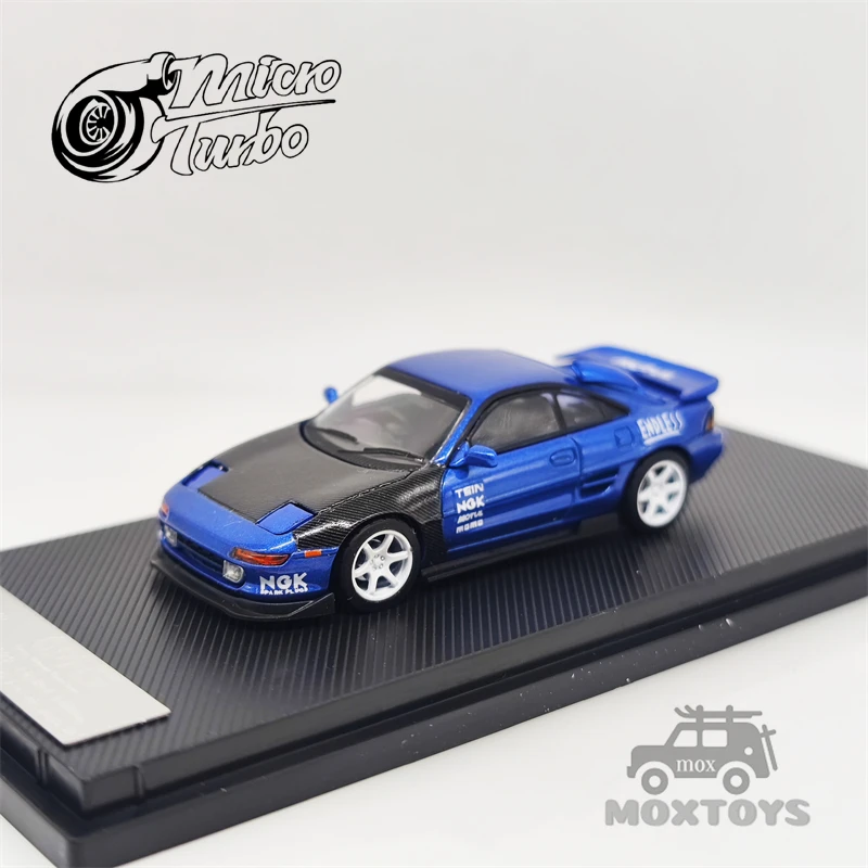 

MicroTurbo 1:64 Toyota MR2 SW20 модифицированная версия 2023 GMH выставка углеродная металлическая синяя ограниченная модель автомобиля под давлением 599