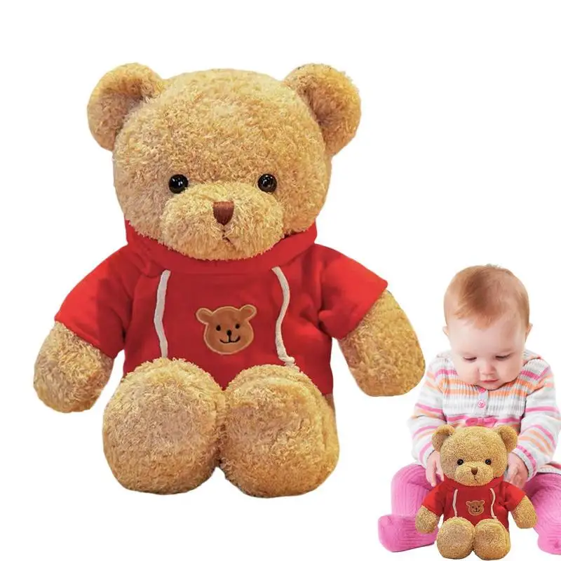 

Мягкие игрушки в лесу с изображением медведя