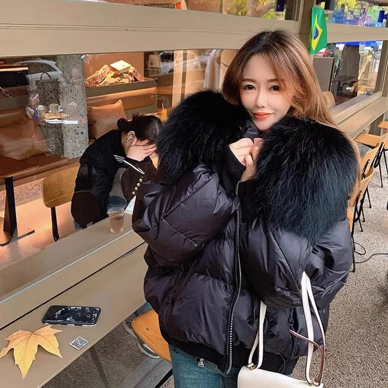 Женский пуховик с воротником из лисьего меха на 90% белом утином пуху