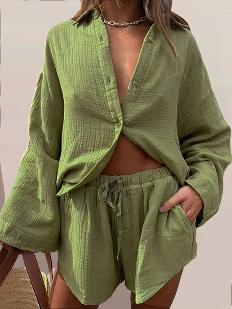 

Женский повседневный комплект из двух предметов, рубашка на пуговицах с отложным воротником и шорты на шнуровке, свободный пляжный костюм н...