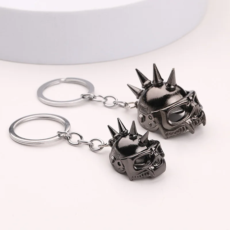 

New Mini Simulation Metal Skull Keychain Creative Game Helmet Keyring Man Car Keychains Women Bag Pendant Couple Key Chain