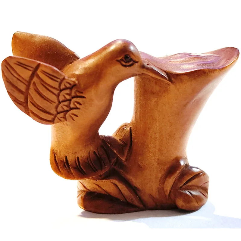 

Резная статуэтка из самшита птица