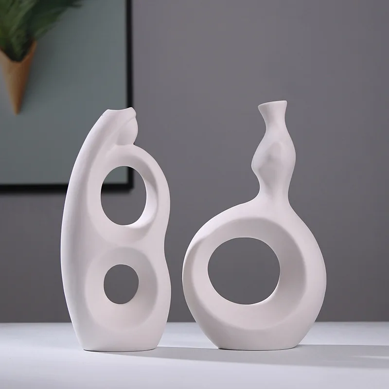 

Белая керамическая ваза особой формы CAPIRON, матовые полые дизайнерские абстрактные современные художественные украшения для дома, гостиной,...