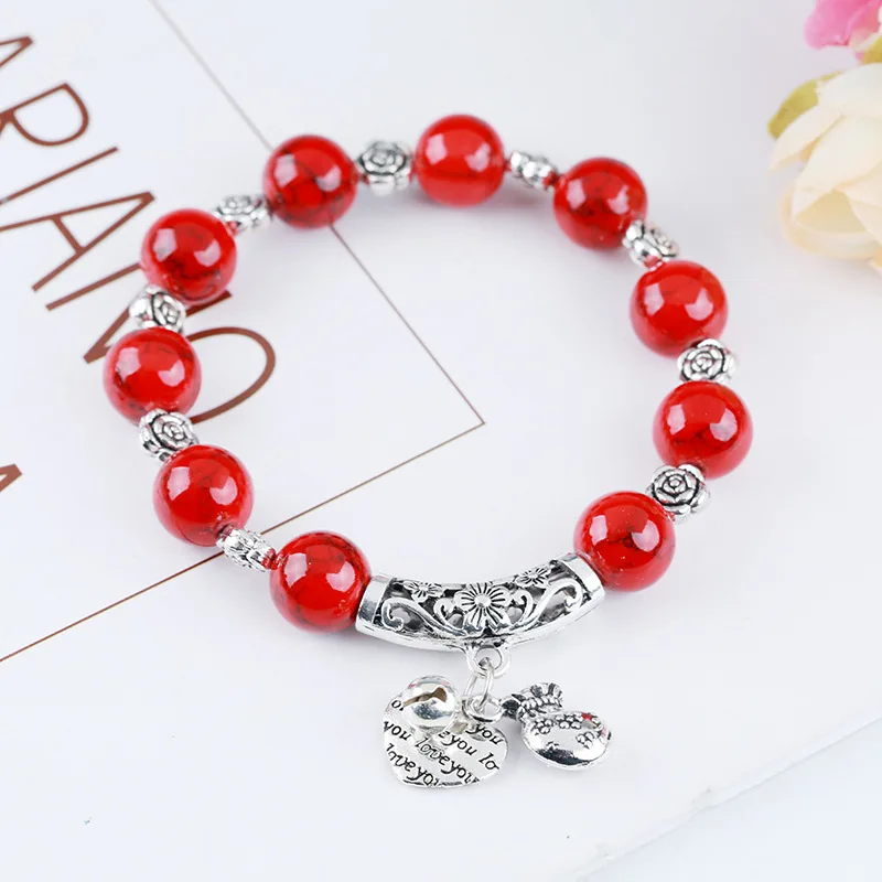 

Женский браслет из искусственного камня ярких цветов