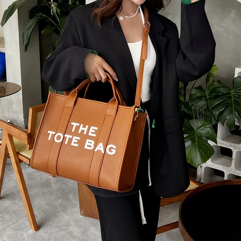 

brand THE TOTEBAG 2023 New Solid Color Letter Embossed Large Capacity Tote Bag Single Shoulder Crossbody designer Bags for Women