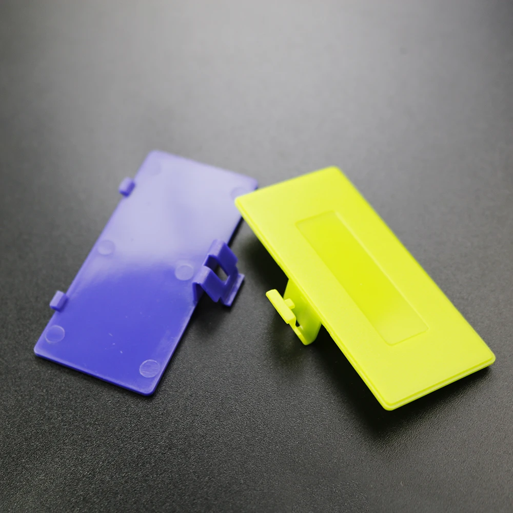 Фото YUXI 1 шт. 8 цветов на выбор, сменная Крышка батарейного отсека для Game Boy Pocket Gameboy GBP, Крышка батарейного отсека №4