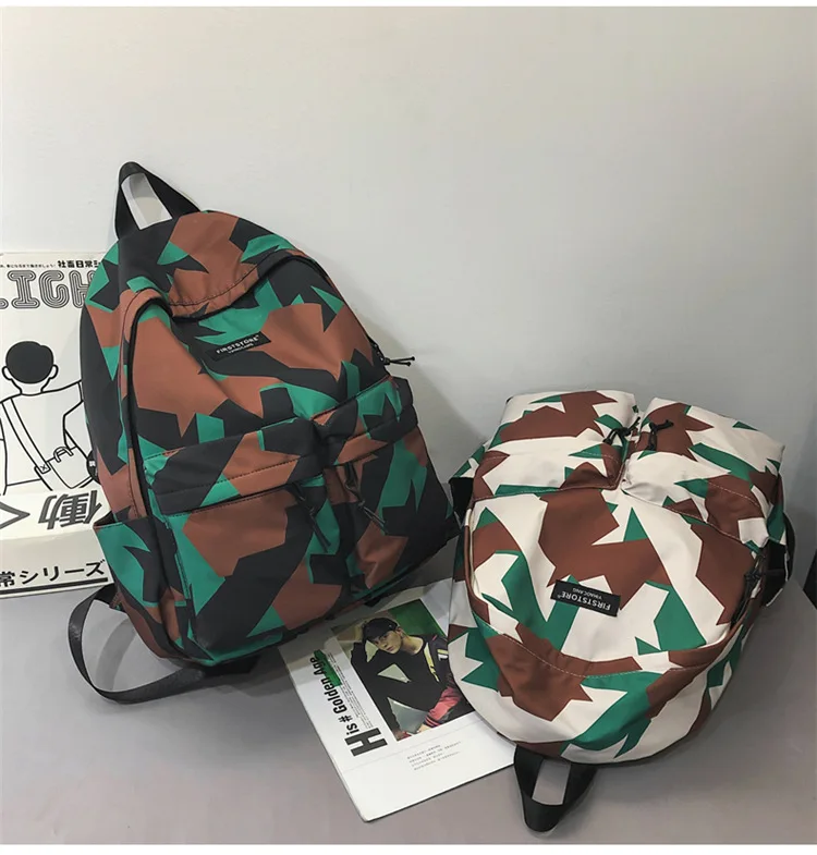 Korean fashion couple large capacity backpack female personalized graffiti double button bag student schoolbag male Backpack