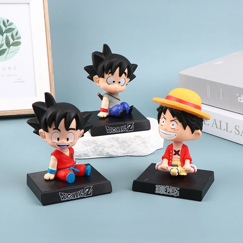 

12cm Anime one piece Dragon Ball Action Figure Monkey D Luffy Son Goku Shaking Head Kawaii Figurine Collectible Model Car Toy