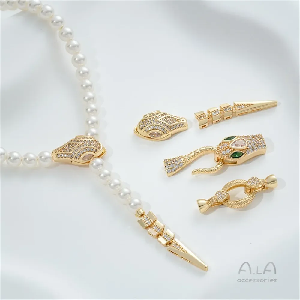 Пряжка в виде головы змеи с микроинкрустацией из циркона 14-каратное золото