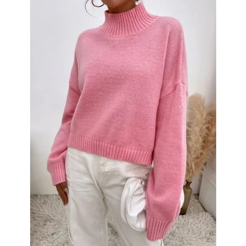 

Женский трикотажный свитер с высоким воротником и рукавами-фонариками