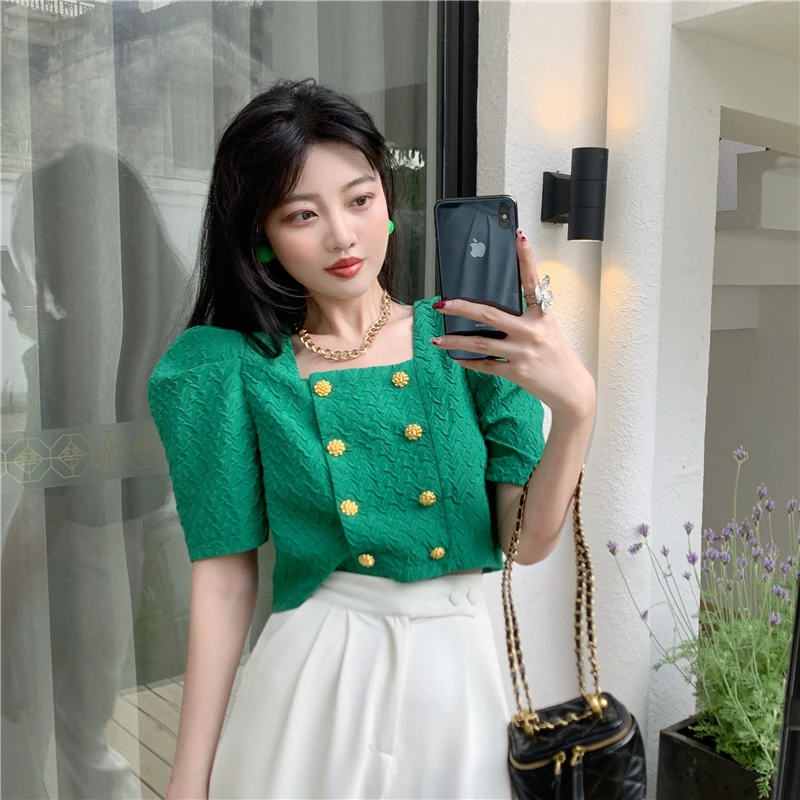 Make the net price of French small collar short jacket summer han edition female embossing hubble-bubble sleeve shirt double-bre |