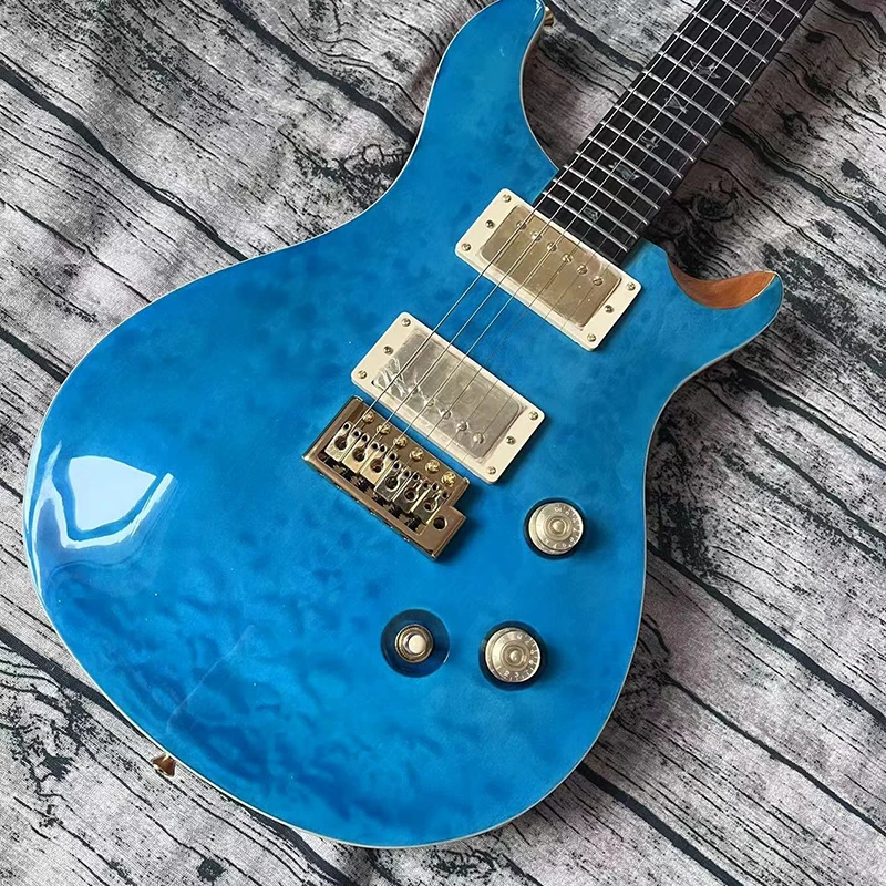 

This is a professional 6-string electric guitar with a bright blue face and a beautiful voice. It is mailed home