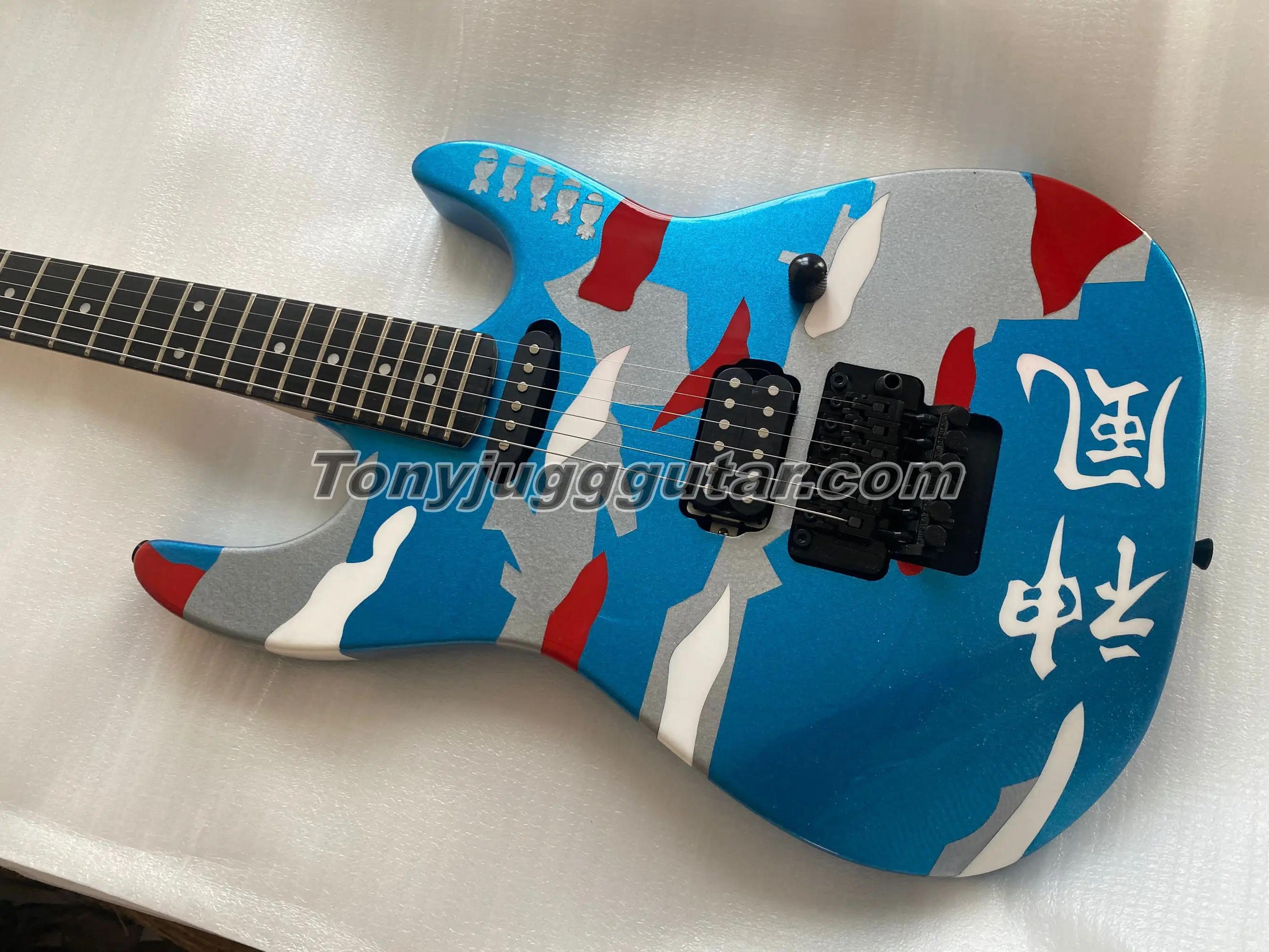 

Custom Shop Hand Painted Metallic Blue GeorgeLynch Kamikaze-IV 6-String Electric Guitar, Floyd Rose Tremolo, Black Hardware