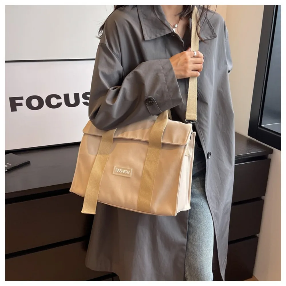 

2023 New Fresh Art Canvas Tote Bag Large Capacity New Handheld Commuter Women's Bag Versatile Crossbody Bag