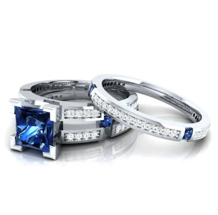 

ANGLANG 2PC Women Silver Colour Finger Rings Wedding Engagement Jewelry Dazzling Blue Cubic Zircon Gorgeous Female Classic Set