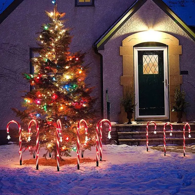 Фото Светильники Candy Cane Pathway Светильники Candy Cane на солнечной энергии Маркеры для дорожек 1–8 светодиодных фонарей Торшер со звездой Рождества №4