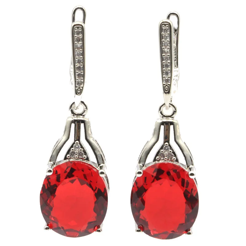 

Серьги из серебра 925 пробы с красными камнями, 9 г