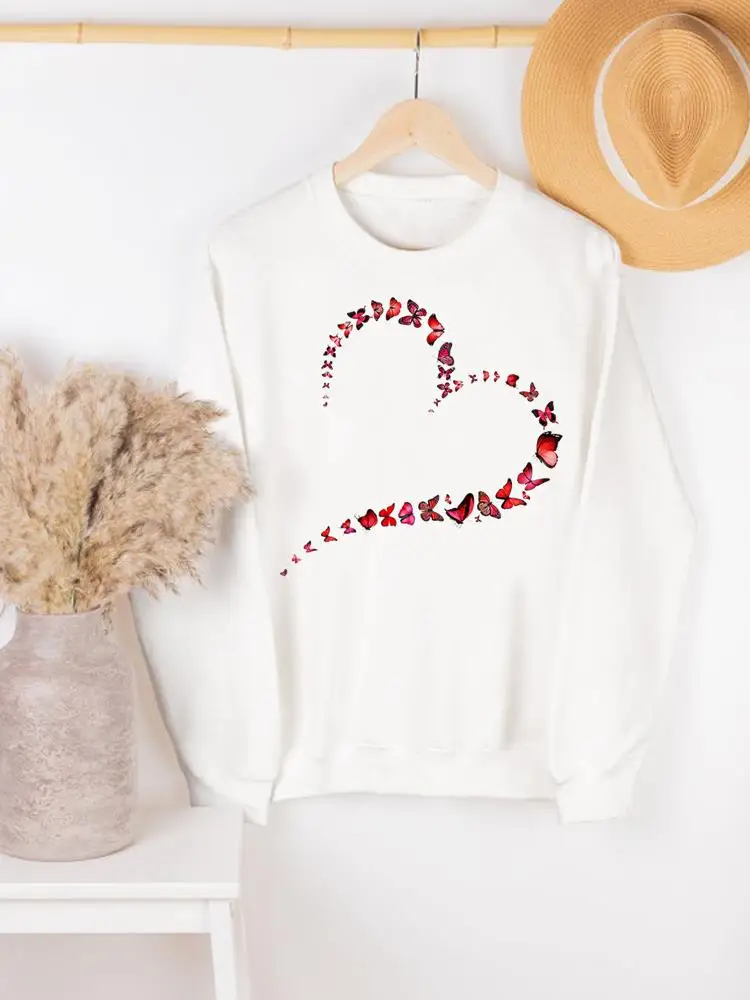 

Женские пуловеры в стиле 90-х с принтом сердечек и бабочек