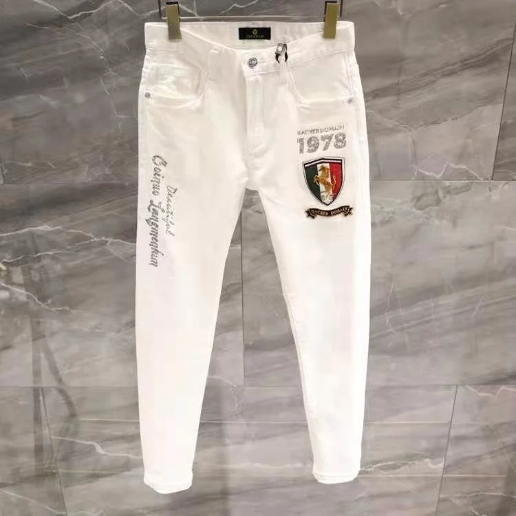 Джинсы мужские облегающие эластичные с вышивкой и надписью