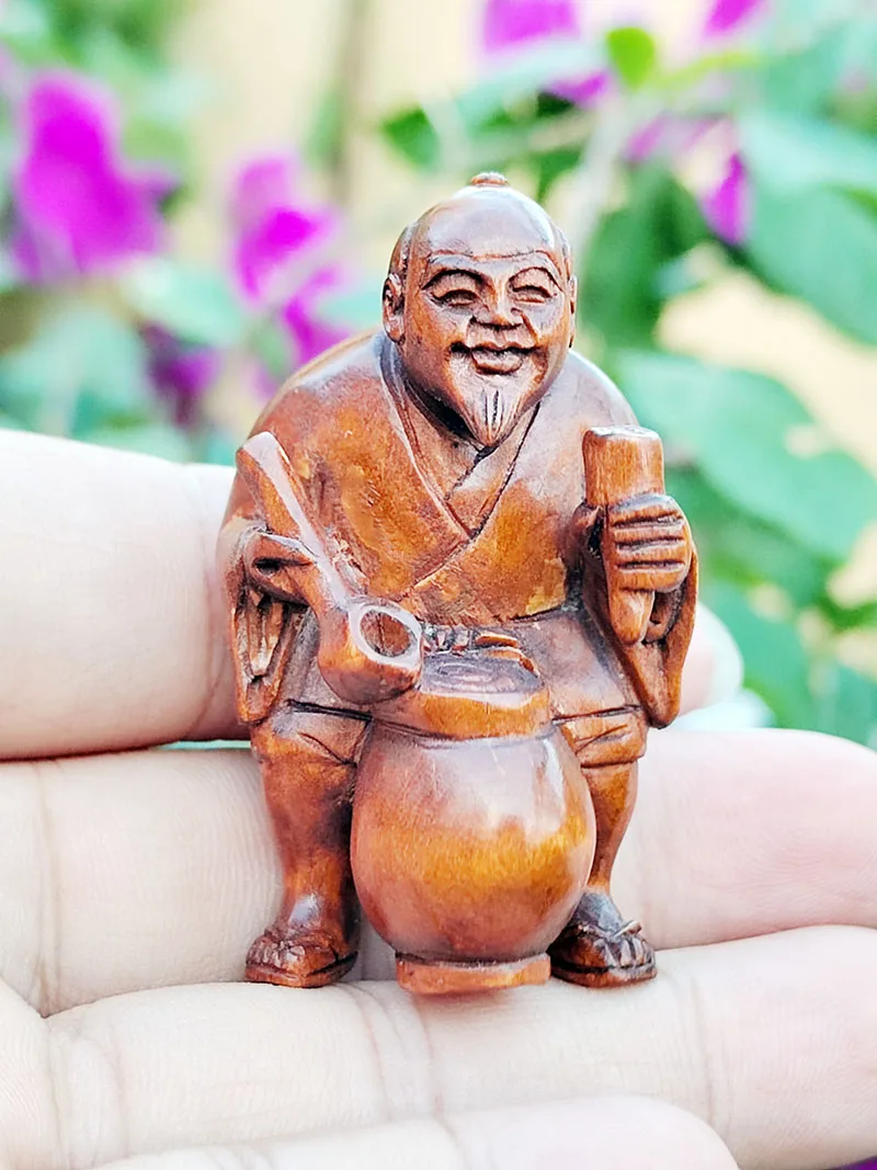 

Ручная статуэтка из самшита Elder Man Selling Beer