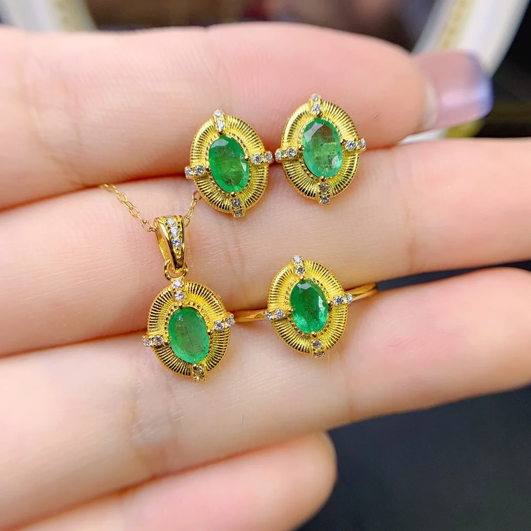 Женский ювелирный набор из серебра 925 пробы с изумрудами