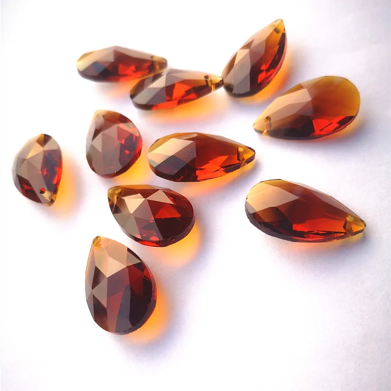 

New Arrived 12pcs/lot 28mm K9 Amber Crystal Chandelier Faceted Pointed Pear Pendants Glass Lighting Parts For DIY Suncatcher