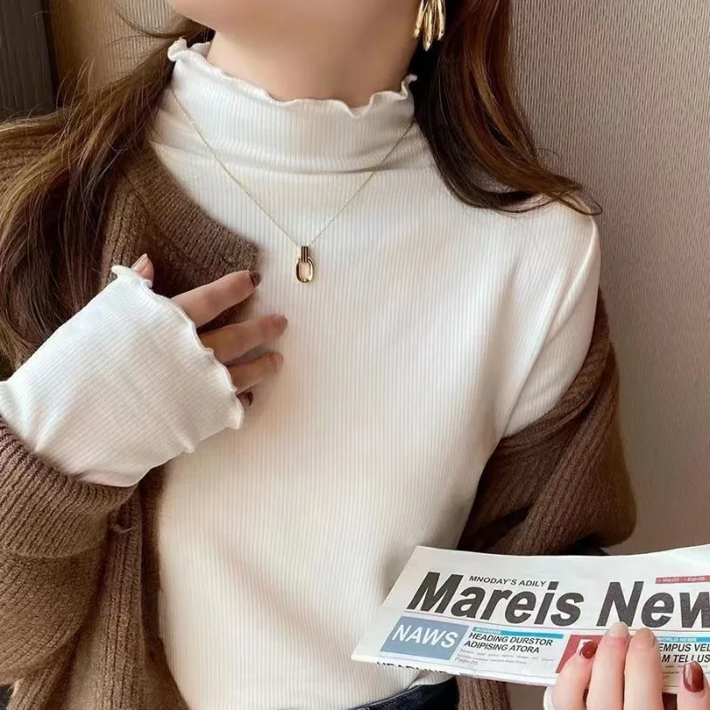 Женские пуловеры с воротником-хомутом и боковой нитью