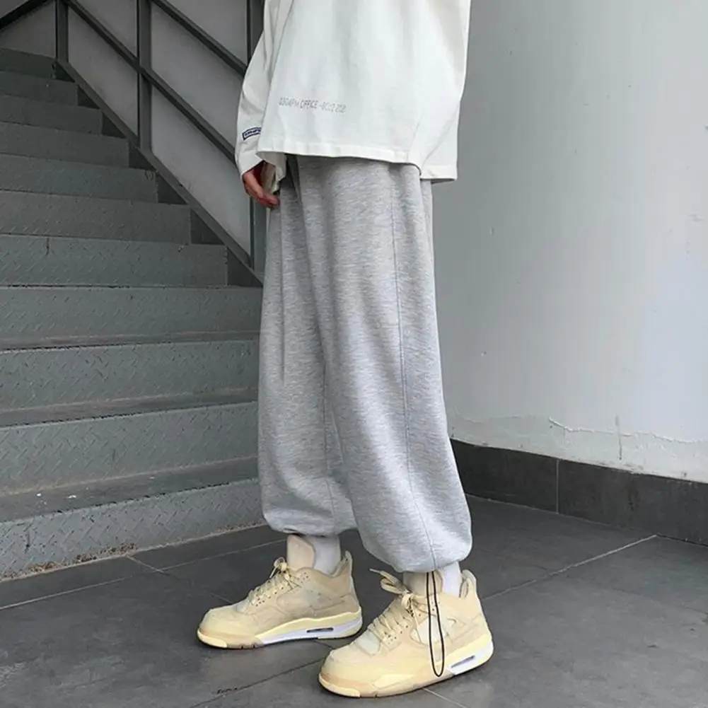 

2022 Men Sweatpants Solid Color Draping Elastic Waist Loose Spring Autumn Mid-rise Drawstring Ankle Tied Trousers Men Clothing