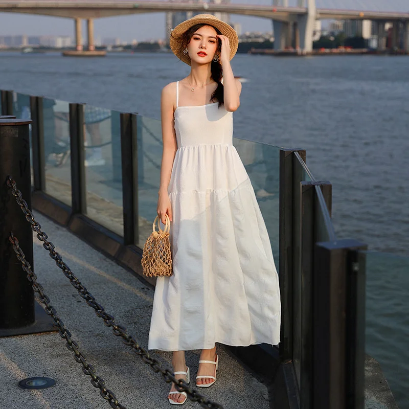 

Seaside fairy suspender dress 2021 spring and summer new white bottomed skirt shows thin temperament long skirt