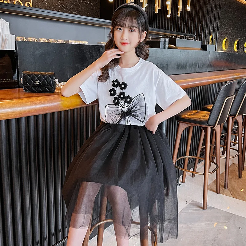 

Футболка с цветочным принтом и бантом для девочек, милый топ с коротким рукавом и черная газовая юбка, комплект из 2 предметов, милая Повседн...