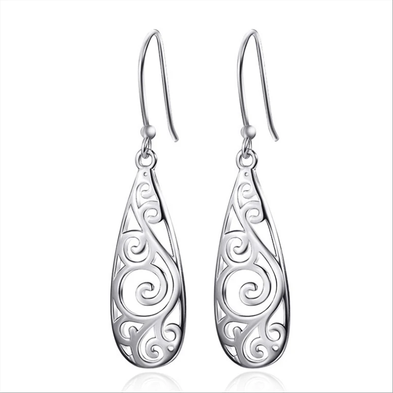 

Minimalist Hollowed Out Carved Pattern Water Drop Shaped Women's Earrings with Retro Ethnic Style Women's Daily Ear Jewelry