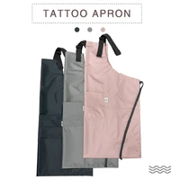 tattoo apron handmade adjustable high quality waterproof tattoo working apron with neck straps tools pockets body art accesso