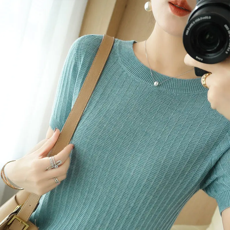 

Short-sleeved T-shirt female loose cotton new Korean version of large size cover belly thin yarn jacket car color thin sweater