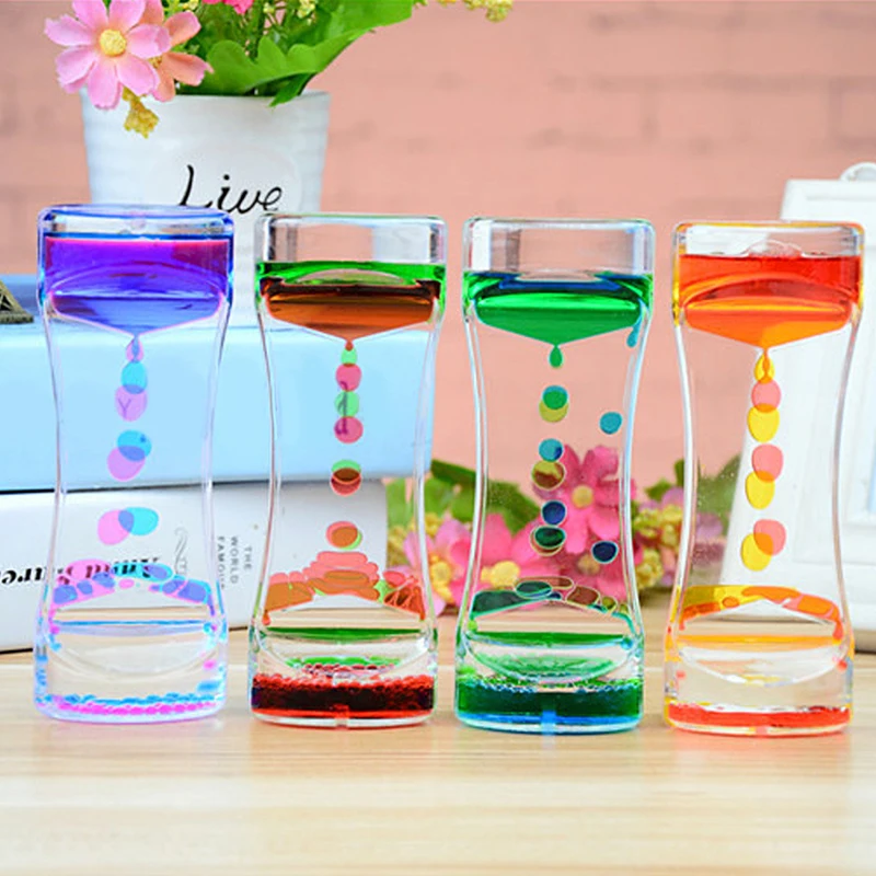 

Two-color floating liquid hourglass visual movement timer glass acrylic clock home decoration desk decoration