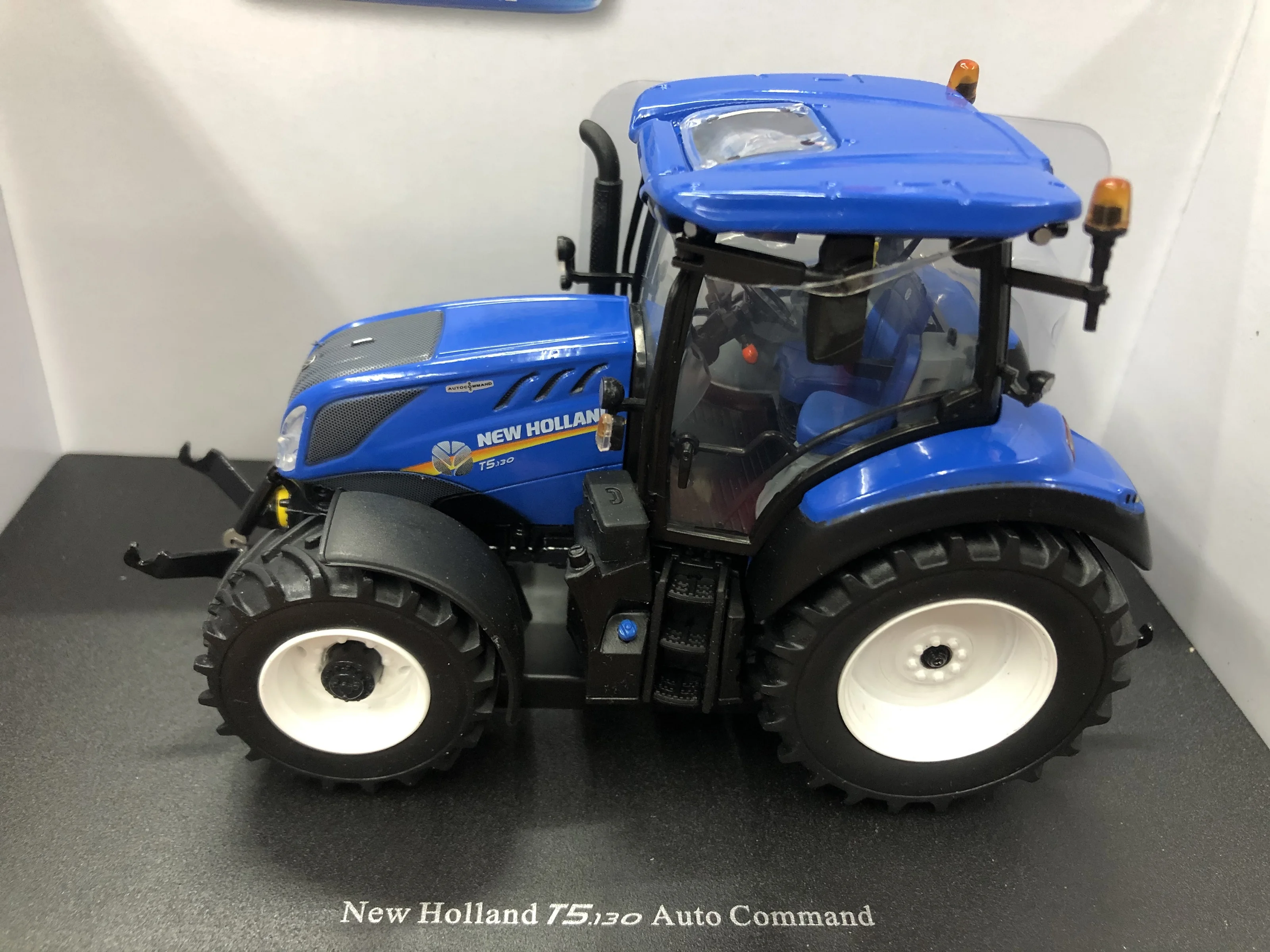 

UH 5360 1:32 New Holland T5.130 модель автомобильного трактора, подарки, Сувенирные игрушки