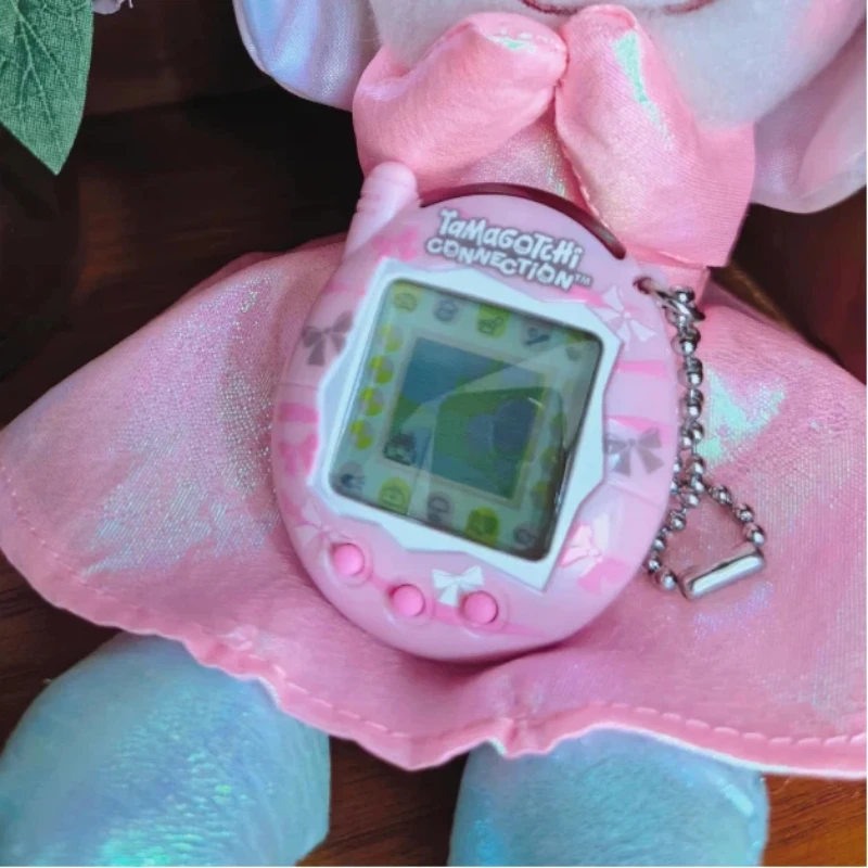 Фото Новый интерактивный электронный виртуальный питомец Bandai Tamagotchi V3: оригинальная игровая приставка-брелок, подарок для коллекционеров №5