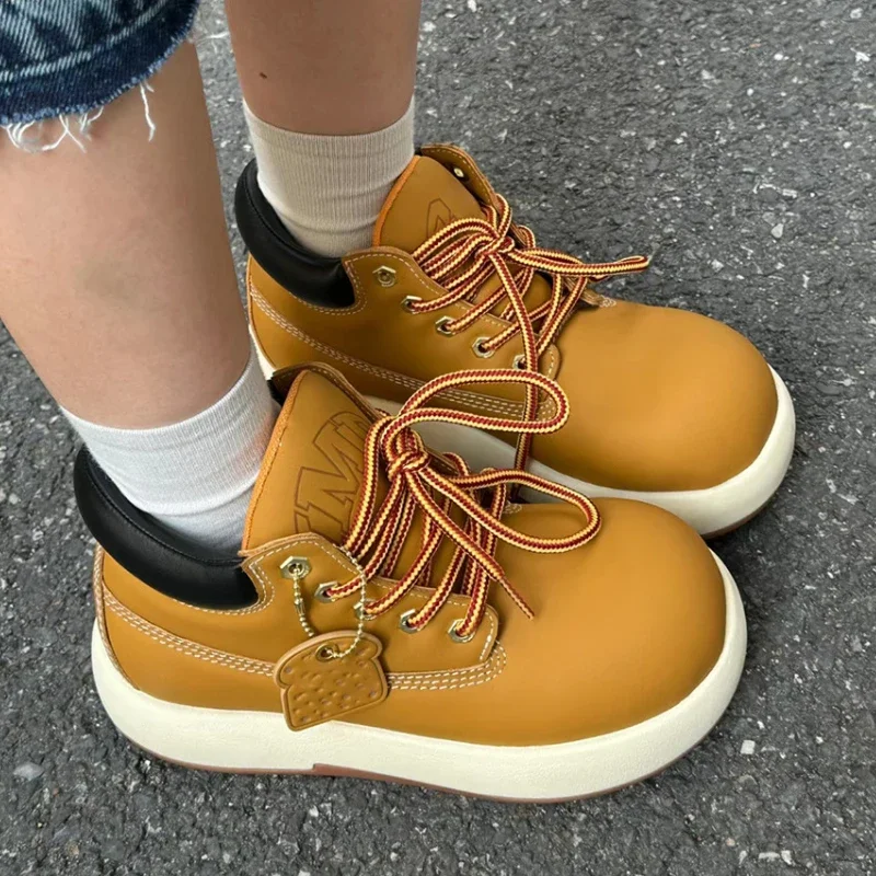 Женские ботинки на толстой подошве желтые брендовые платформе с круглым носком