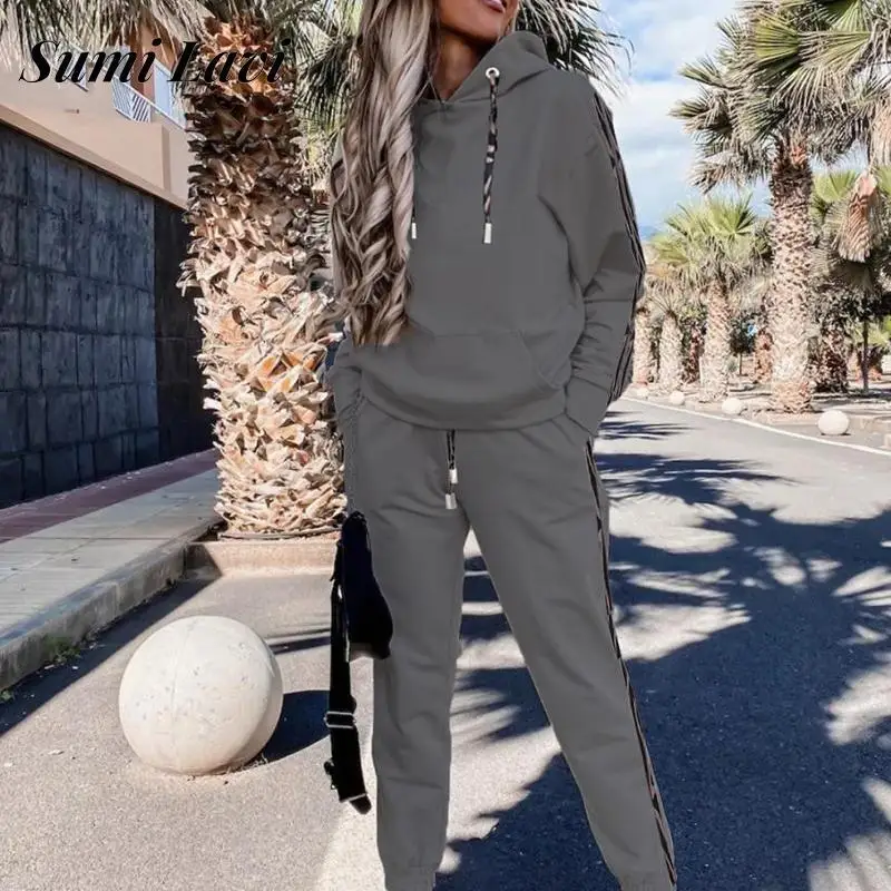 

Модный Свободный спортивный костюм, повседневный костюм с толстовкой с длинным рукавом и брюками на шнуровке, женская элегантная полосатая...