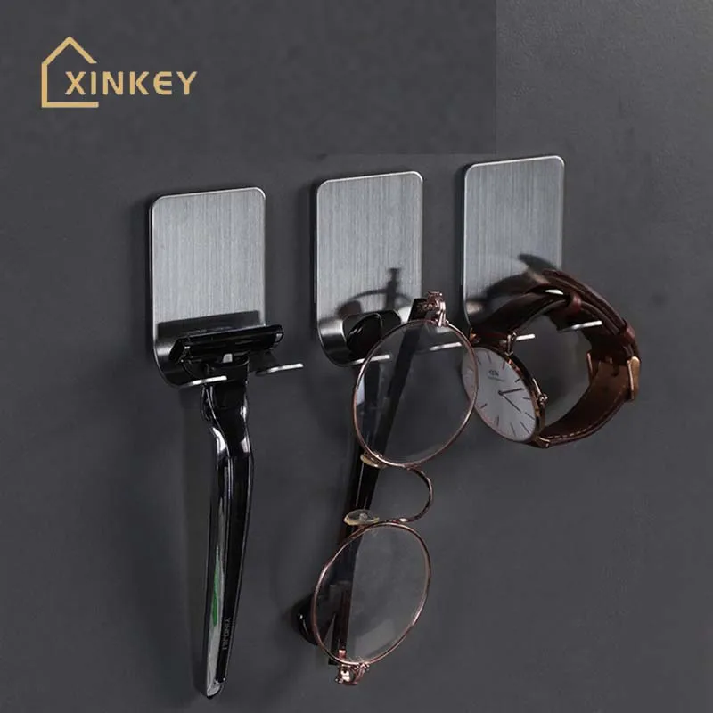 

Punch free stainless steel shaver holder Men's shaver storage hook wall shelf shaver holder Bathroom accessories organization