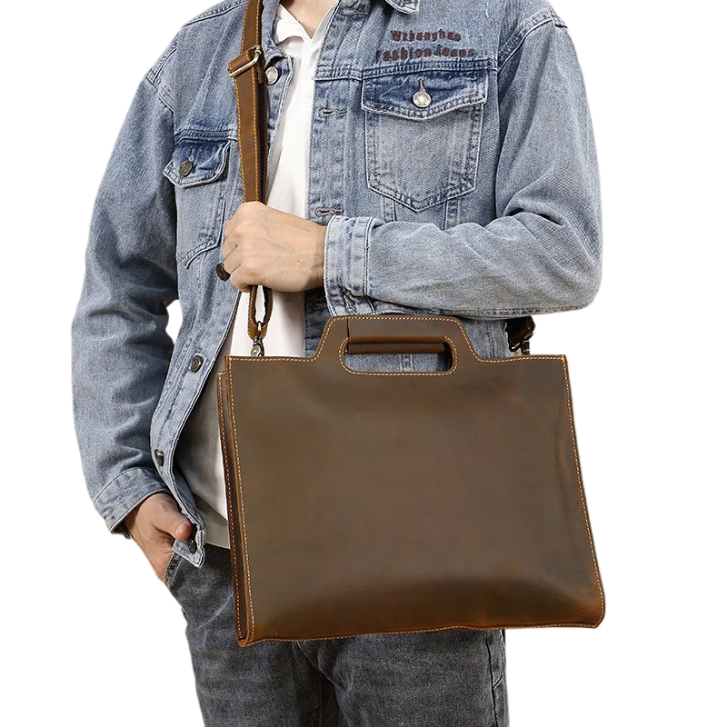 Винтажная кожаная мужская сумка с ручками сверху